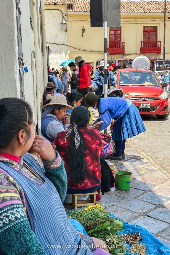 Local People outside of the San Pedro Market in Cusco, Peru